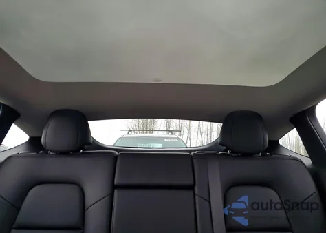 2025 Tesla Model Y from USA, damaged, VIN 7SAYGAEEXSF297083